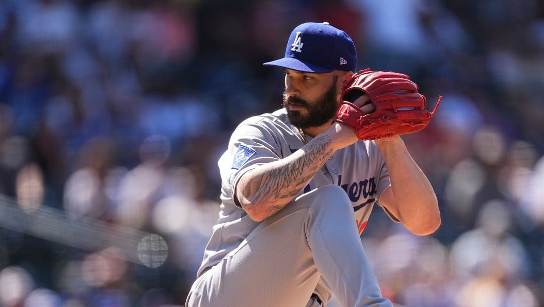Los Angeles Dodgers relief pitcher Tanner Scott (66) in the ninth inning of a baseball game Thursday, June 26, 2025, in Denver. (AP Photo/David Zalubowski)