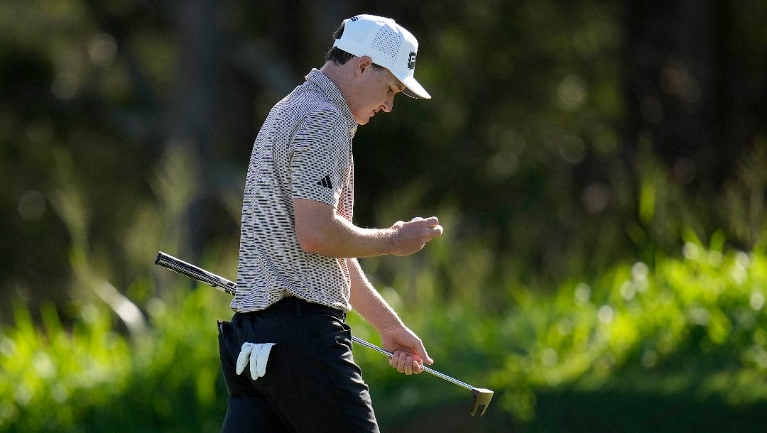 Matt McCarty looks at his ball on the fourth green during the first round of The Sentry golf event, Thursday, Jan. 2, 2025, at Kapalua Plantation Course in Kapalua, Hawaii.